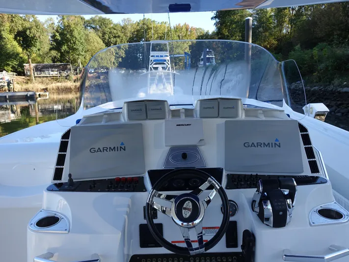 Yacht Photos Pics 2014 Cigarette 42 Huntress boat dashboard with Garmin navigation system.