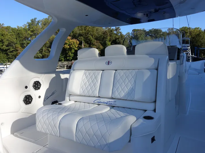  Yacht Photos Pics 2014 Cigarette 42 Huntress boat with luxurious white seating and sleek design.