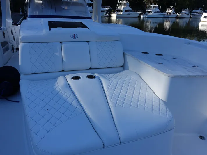  Yacht Photos Pics 2014 Cigarette 42 Huntress boat interior with white quilted seating.