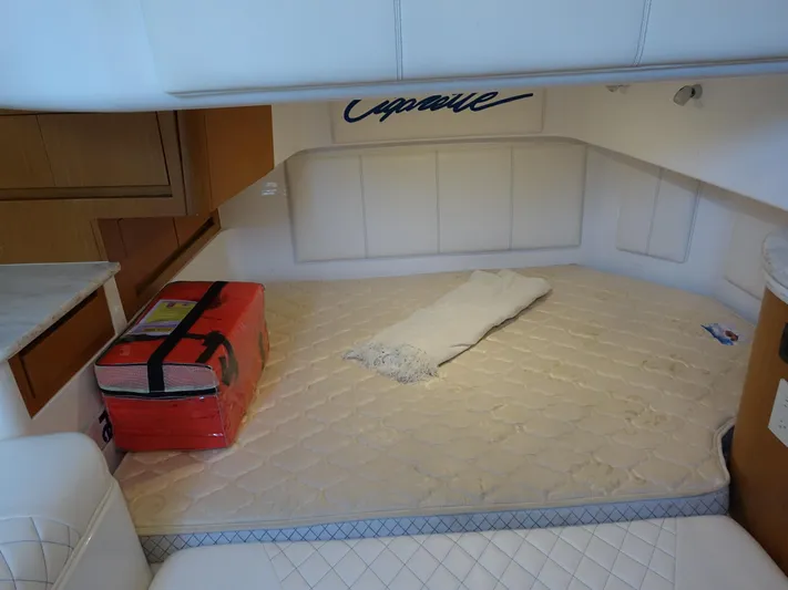  Yacht Photos Pics Interior cabin of 2014 Cigarette 42 Huntress with bed and storage.