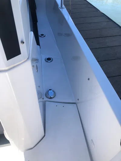  Yacht Photos Pics Beneteau Antares 9 (2022) boat deck detail with dockside view.