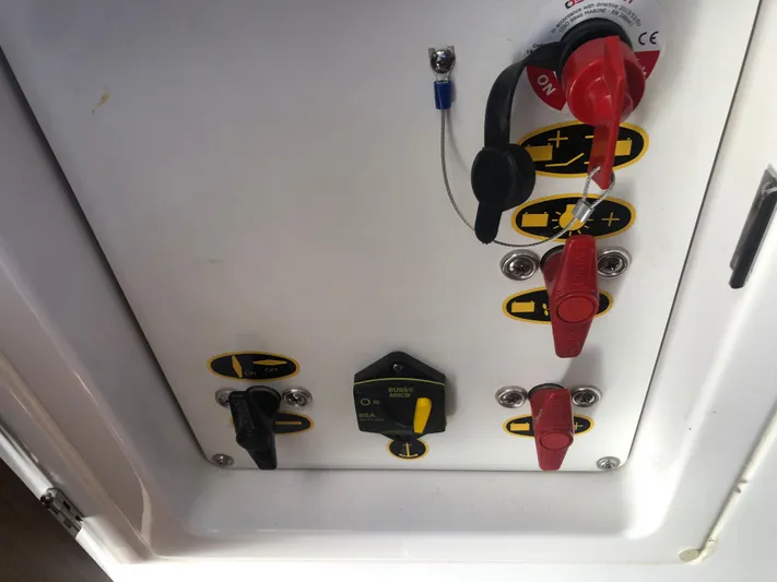  Yacht Photos Pics Control panel of a 2022 Beneteau Antares 9 boat with switches and labels.