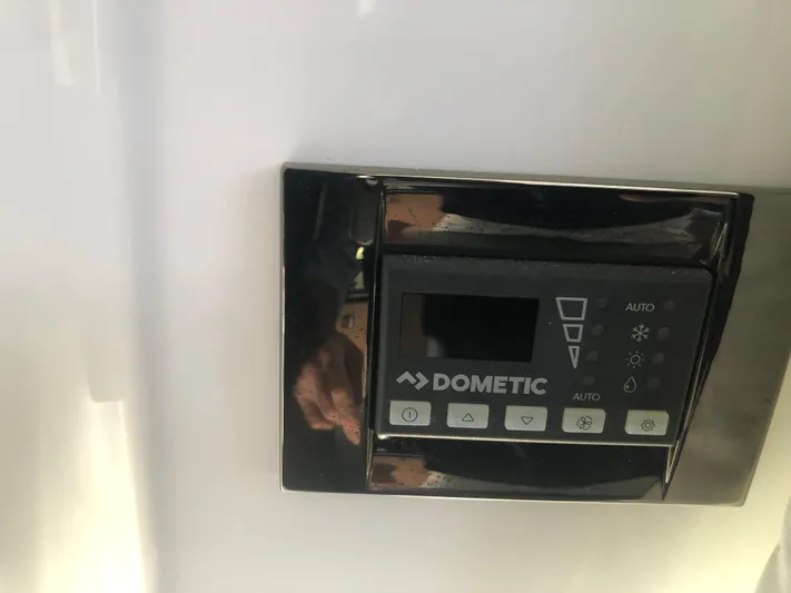  Yacht Photos Pics Dometic control panel on 2022 Beneteau Antares 9 boat interior.