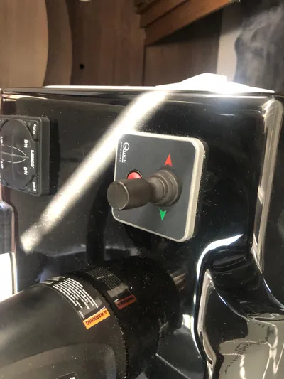  Yacht Photos Pics Control panel of a 2022 Beneteau Antares 9 boat, featuring joystick and switches.