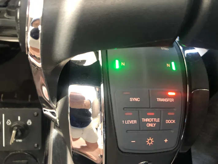  Yacht Photos Pics Control panel of a 2022 Beneteau Antares 9 boat with illuminated buttons.