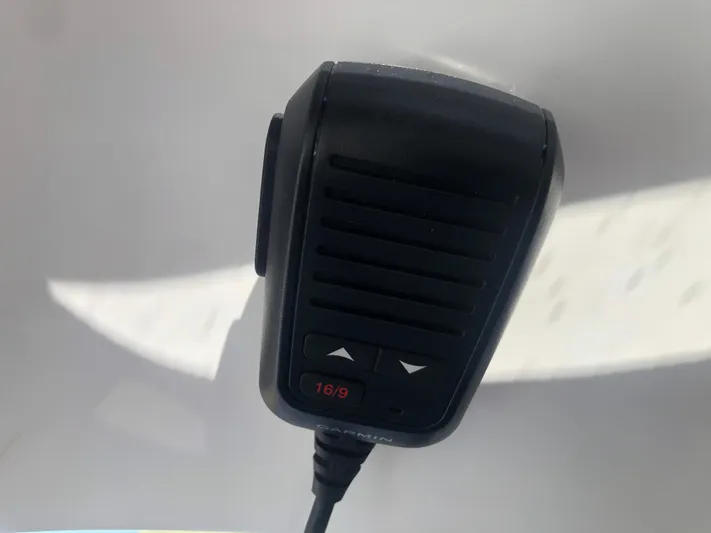  Yacht Photos Pics Close-up of a marine radio microphone on a 2022 Beneteau Antares 9 boat.