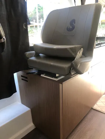  Yacht Photos Pics Captain's chair in 2022 Beneteau Antares 9 boat interior.