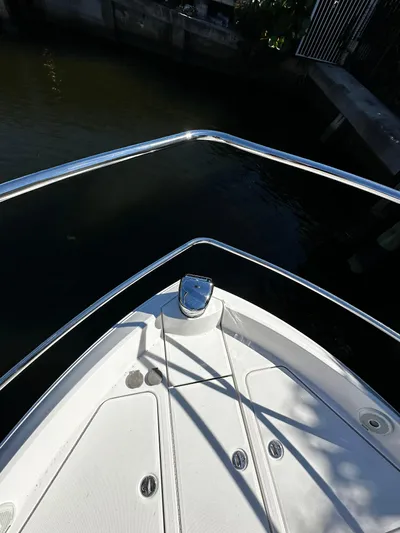Fully Vested Yacht Photos Pics 2022 Regal 42 FXO boat bow with stainless steel railings.