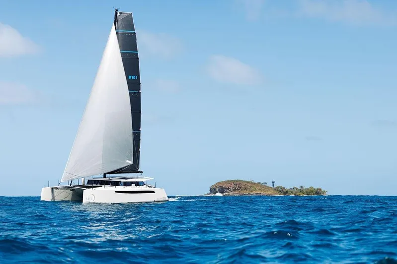  Yacht Photos Pics Sailing yacht Introductory Cure Marine 55, 2025 model, cruising near a small island.