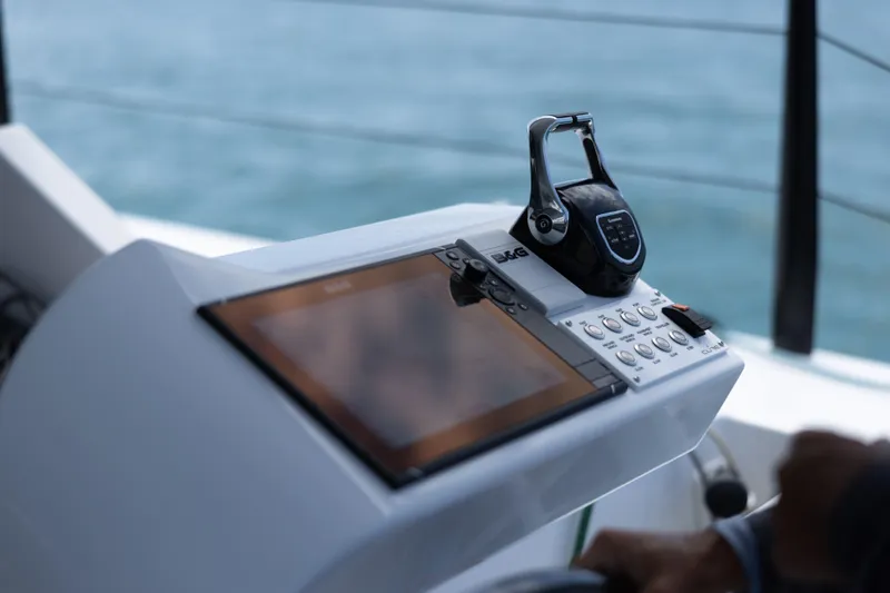  Yacht Photos Pics Control panel of Introductory Cure Marine 55 yacht, 2025 model, with ocean background.