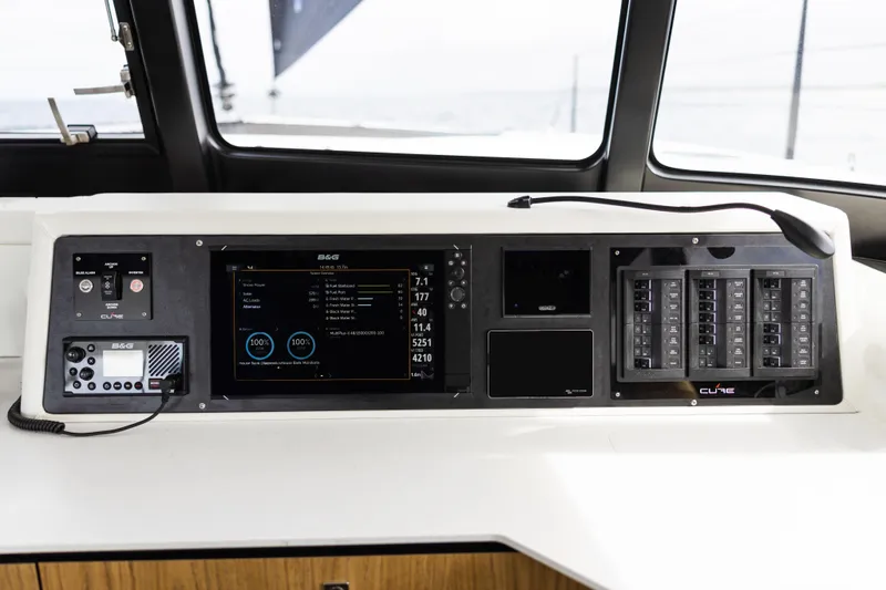 Yacht Photos Pics Control panel of Introductory Cure Marine 55 yacht, 2025 model, featuring advanced navigation systems.