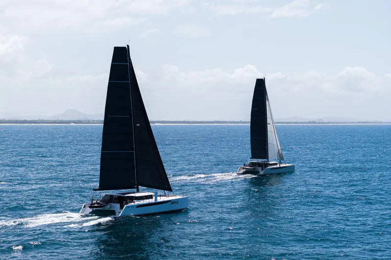  Yacht Photos Pics Two Introductory Cure Marine 55 catamarans sailing on open sea, 2025 model.