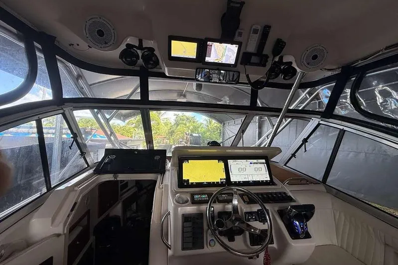  Yacht Photos Pics Interior cockpit of 2007 Grady-White Express 305 boat with advanced navigation systems.