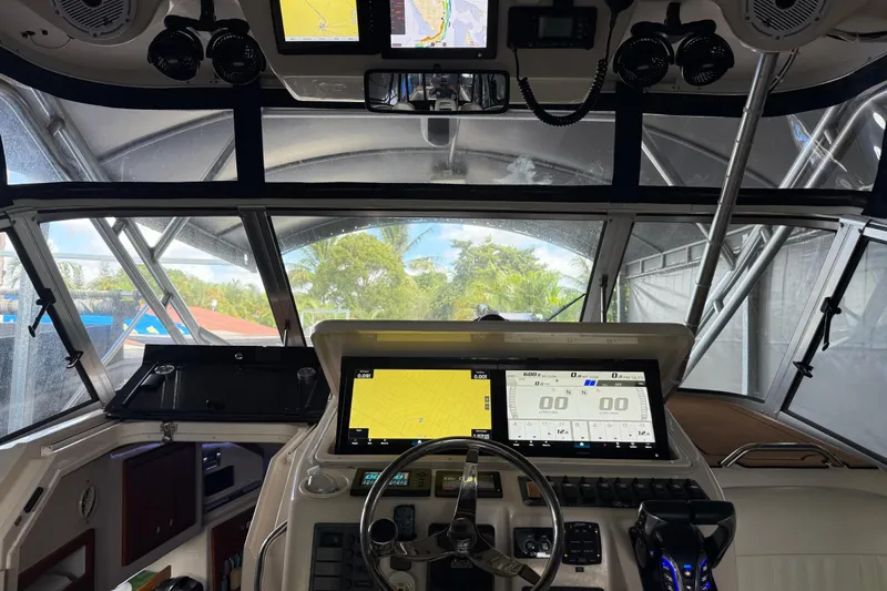  Yacht Photos Pics 2007 Grady-White Express 305 boat cockpit with advanced navigation displays and controls.