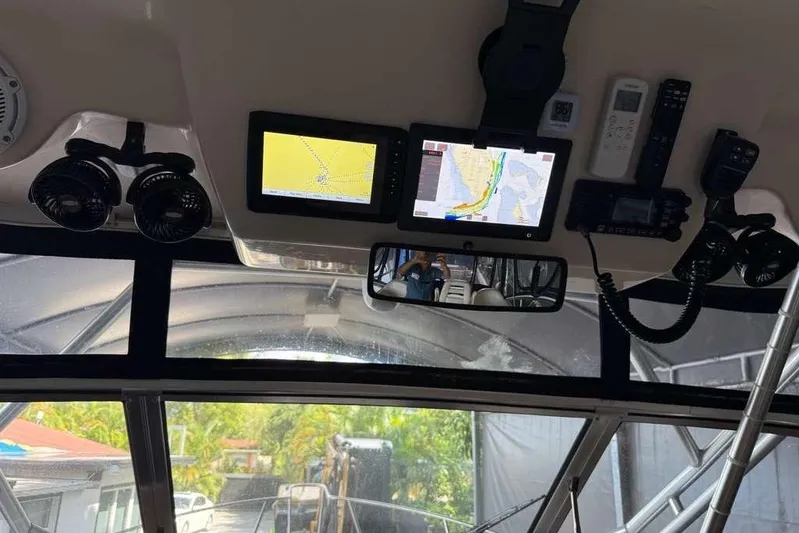  Yacht Photos Pics Interior of 2007 Grady-White Express 305 boat with navigation screens and controls.