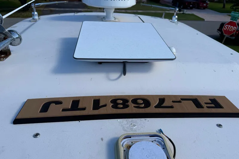  Yacht Photos Pics 2007 Grady-White Express 305 boat deck with registration number FL-7681-T.