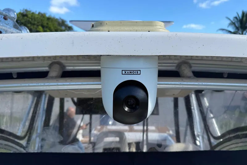  Yacht Photos Pics Security camera on 2007 Grady-White Express 305 boat, clear sky background.