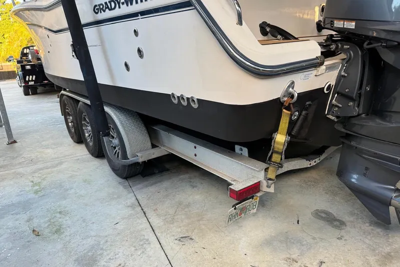  Yacht Photos Pics 2007 Grady-White Express 305 boat on trailer, rear view with outboard motor.