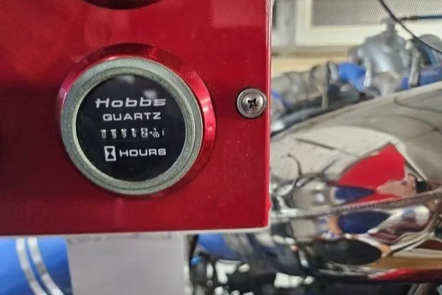 Andiamo Yacht Photos Pics Hobbs Quartz hour meter on 1991 Donzi 65 Sportfisher engine panel.