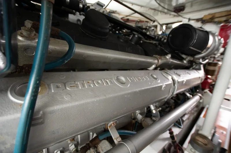 Andiamo Yacht Photos Pics Engine of a 1991 Donzi 65 Sportfisher with visible Detroit Diesel branding.