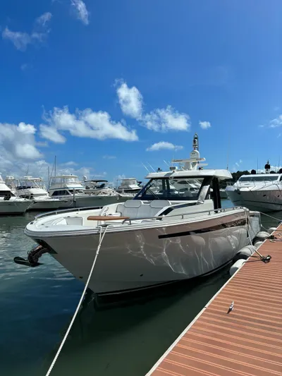  Yacht Photos Pics 2020 Ocean Alexander 45 Divergence yacht docked at marina under clear blue sky.