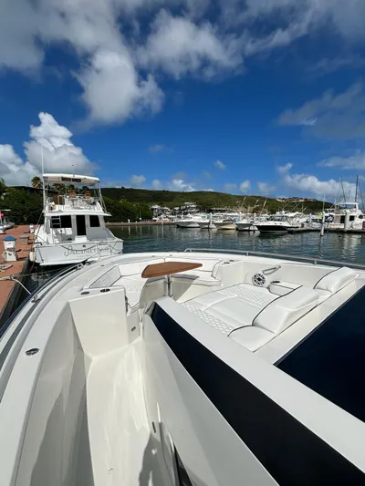  Yacht Photos Pics 2020 Ocean Alexander 45 Divergence yacht docked at a marina under a blue sky.