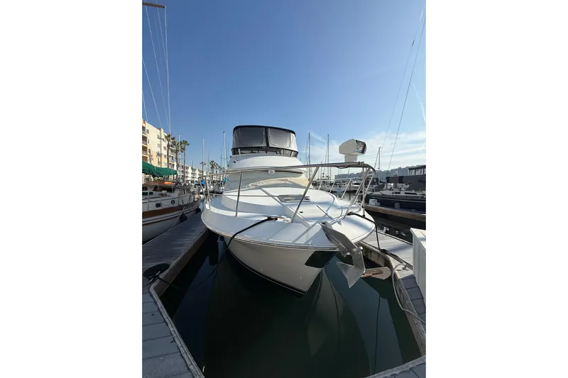 Il Danza Yacht Photos Pics 1999 Carver 406 Aft Cabin Motor Yacht docked in marina under clear blue sky.