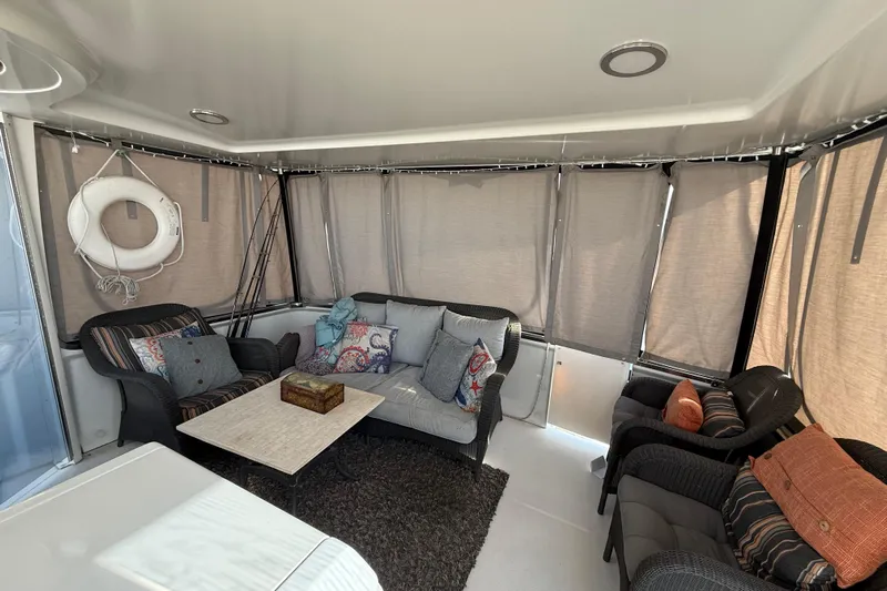 Il Danza Yacht Photos Pics 1999 Carver 406 Aft Cabin Motor Yacht interior with cozy seating and nautical decor.