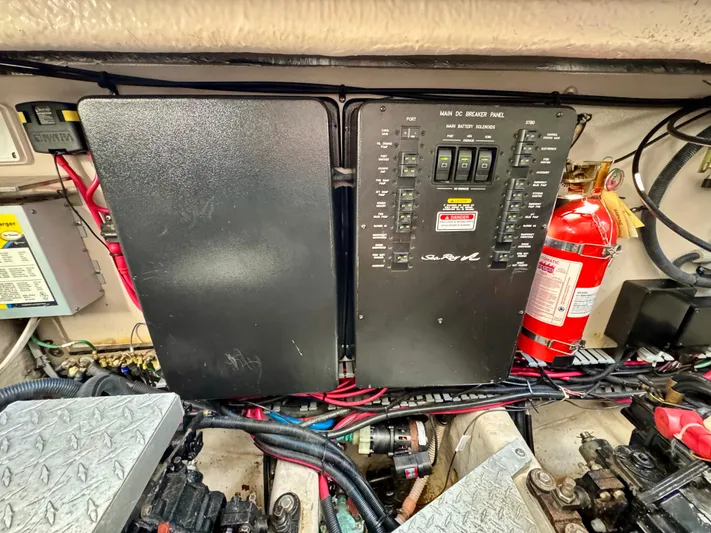 Tranquilo Yacht Photos Pics Electrical panel and fire extinguisher in 2004 Sea Ray 360 Sundancer engine room.