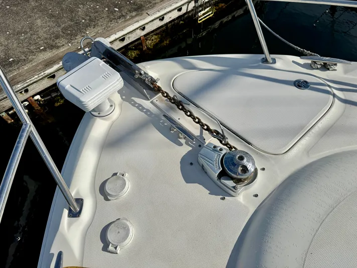 Tranquilo Yacht Photos Pics 2004 Sea Ray 360 Sundancer boat deck with anchor chain and winch system.