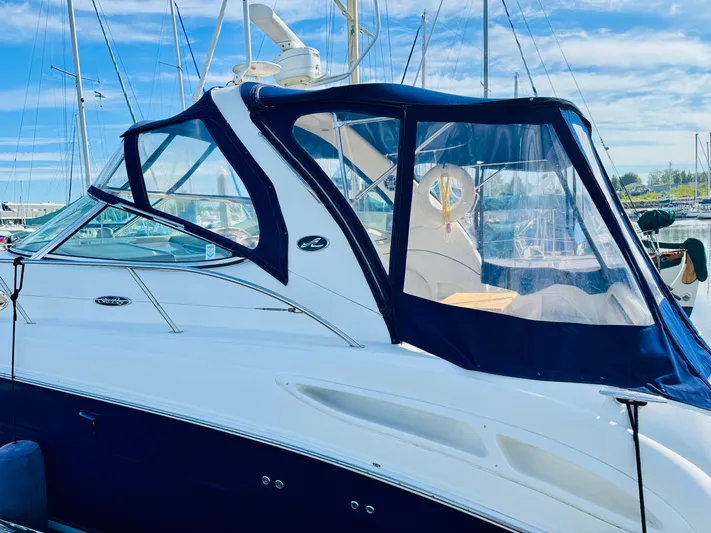 Tranquilo Yacht Photos Pics 2004 Sea Ray 360 Sundancer yacht docked at marina under blue sky.