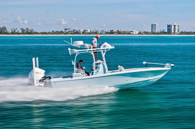  Yacht Photos Pics 2023 Barker Boatworks 26 Open cruising on clear blue water.