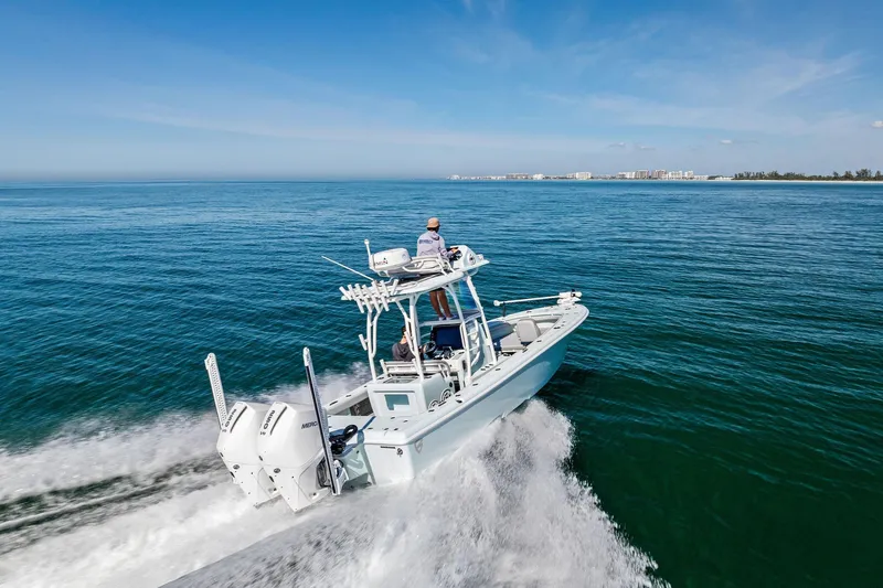  Yacht Photos Pics 2023 Barker Boatworks 26 Open cruising on open water, showcasing sleek design and performance.