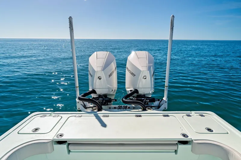  Yacht Photos Pics 2023 Barker Boatworks 26 Open with dual Mercury engines on open sea.