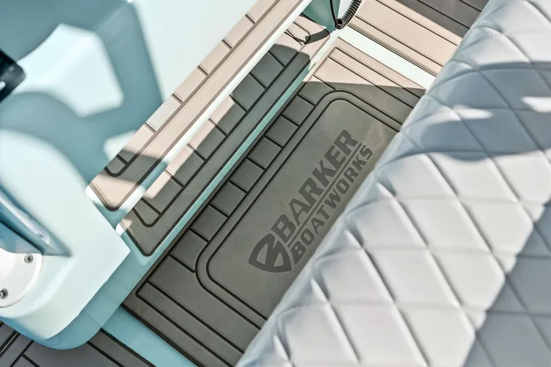  Yacht Photos Pics 2023 Barker Boatworks 26 Open interior with logo and quilted seating.