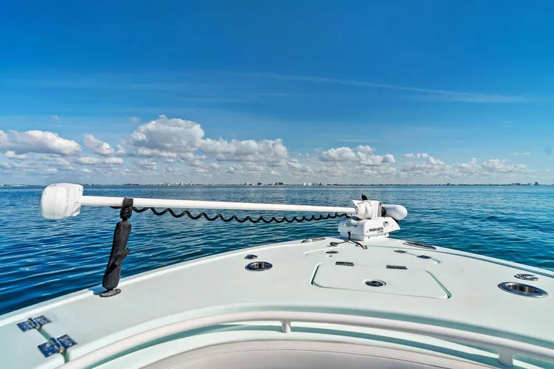  Yacht Photos Pics 2023 Barker Boatworks 26 Open on calm blue waters under a clear sky.