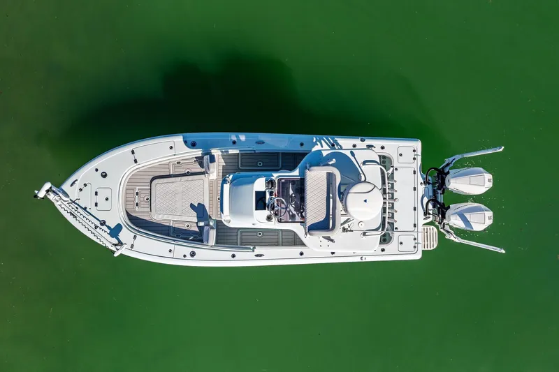  Yacht Photos Pics 2023 Barker Boatworks 26 Open, aerial view on green water.