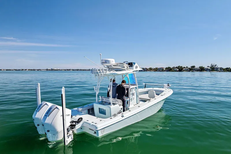  Yacht Photos Pics 2023 Barker Boatworks 26 Open on calm water, featuring dual engines.
