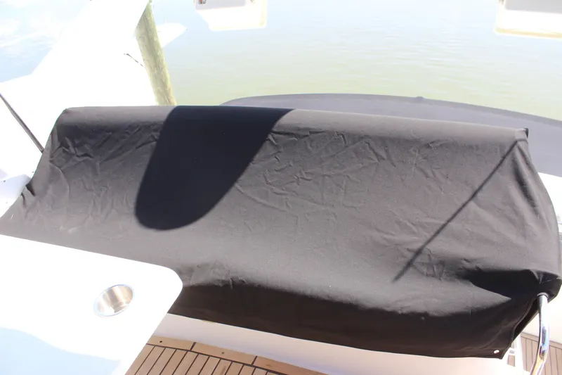  Yacht Photos Pics Covered seating area on a 2003 Carver 36 Super Sport boat deck.