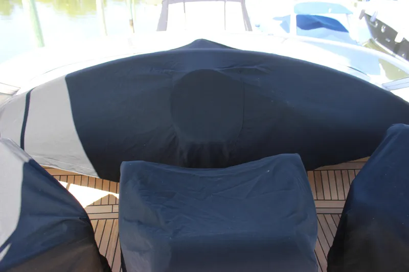  Yacht Photos Pics 2003 Carver 36 Super Sport yacht with covered seating on deck.