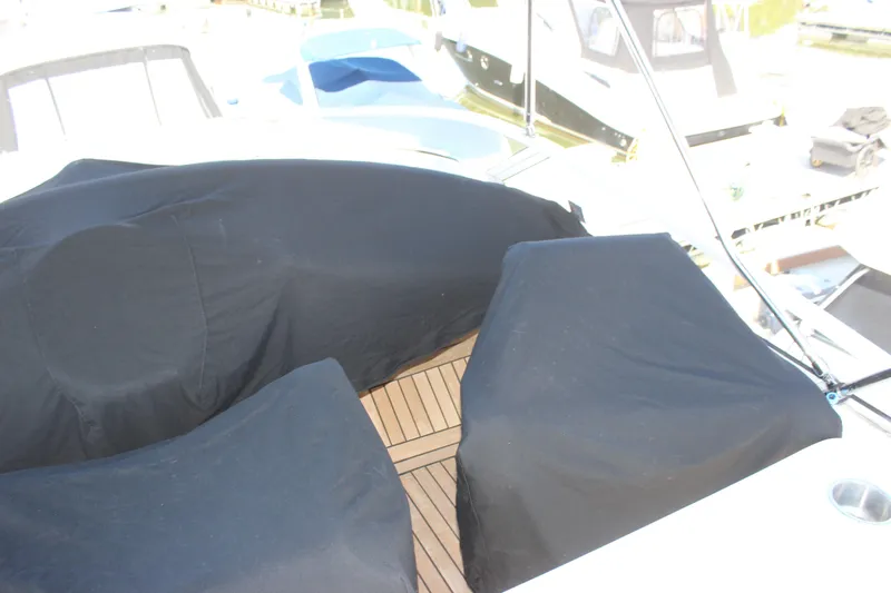  Yacht Photos Pics 2003 Carver 36 Super Sport yacht deck with covered seating area.