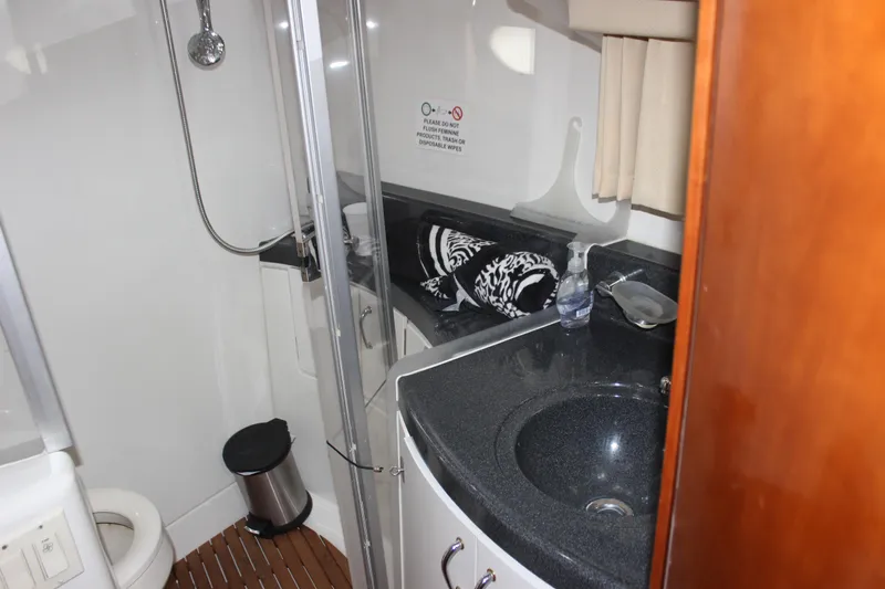  Yacht Photos Pics Bathroom interior of 2003 Carver 36 Super Sport yacht with shower and sink.