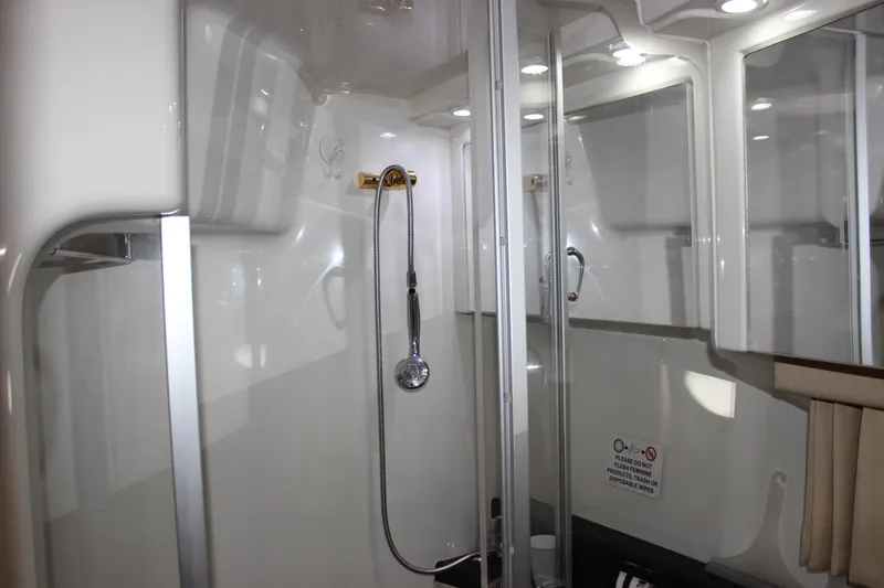  Yacht Photos Pics Interior of 2003 Carver 36 Super Sport yacht bathroom with shower and modern fixtures.