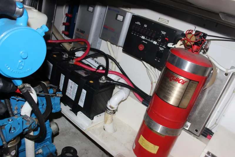  Yacht Photos Pics Engine room of 2003 Carver 36 Super Sport with fire extinguisher and battery system.