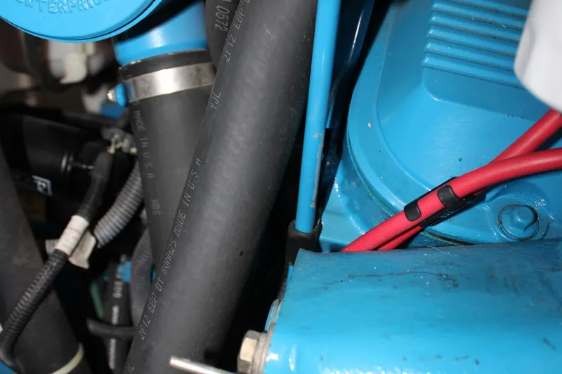  Yacht Photos Pics Engine components of a 2003 Carver 36 Super Sport, featuring hoses and wiring.