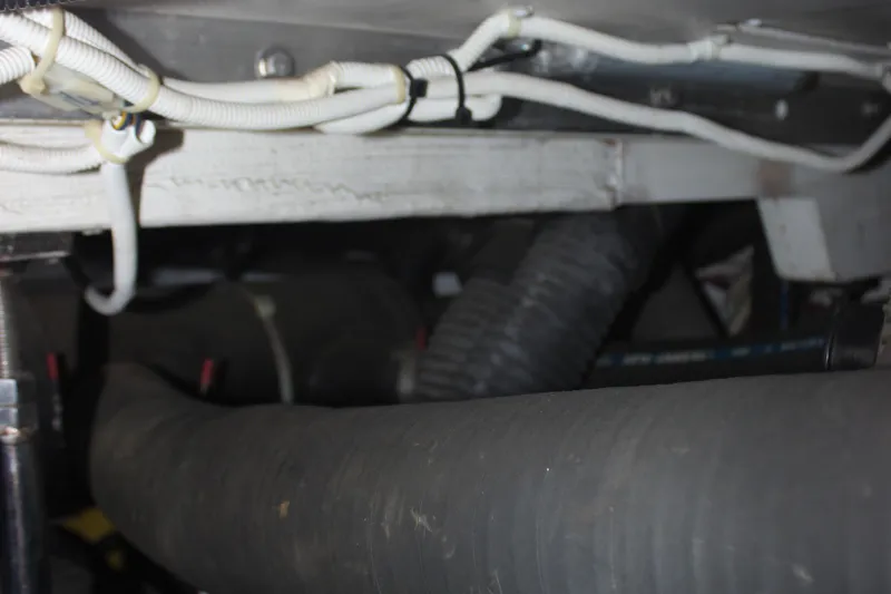  Yacht Photos Pics 2003 Carver 36 Super Sport engine compartment with wiring and hoses.