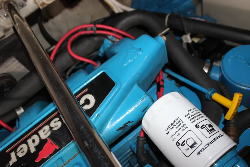  Yacht Photos Pics Engine compartment of 2003 Carver 36 Super Sport with blue components and red wiring.