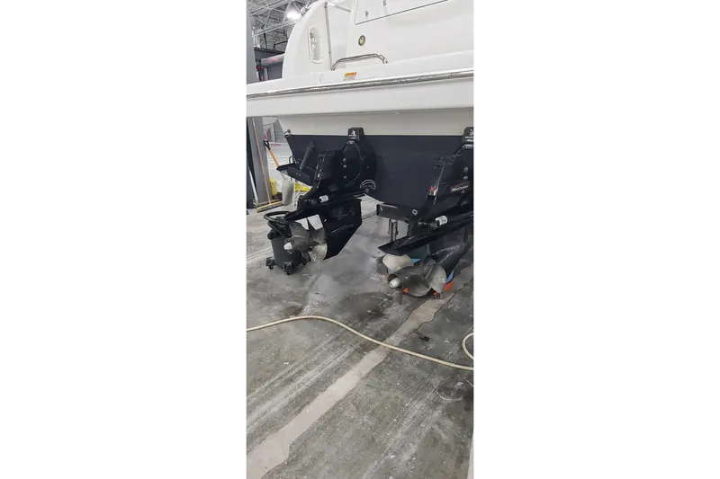  Yacht Photos Pics 2010 Formula 31 Performance Cruiser boat with dual propellers in a workshop setting.