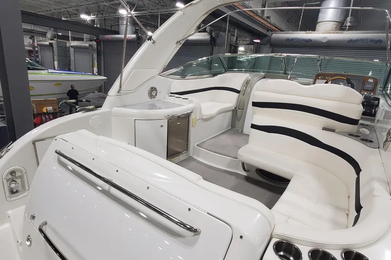  Yacht Photos Pics 2010 Formula 31 Performance Cruiser interior with white seating and modern amenities.