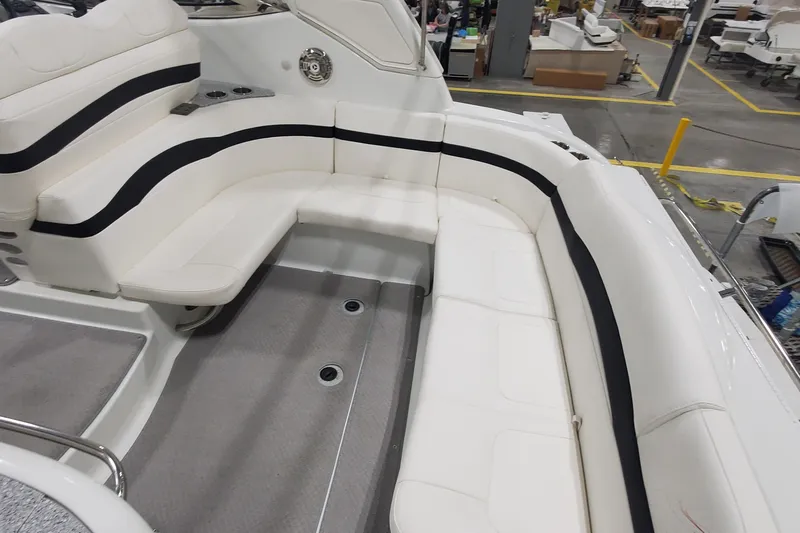  Yacht Photos Pics 2010 Formula 31 Performance Cruiser interior with white seating and black accents.